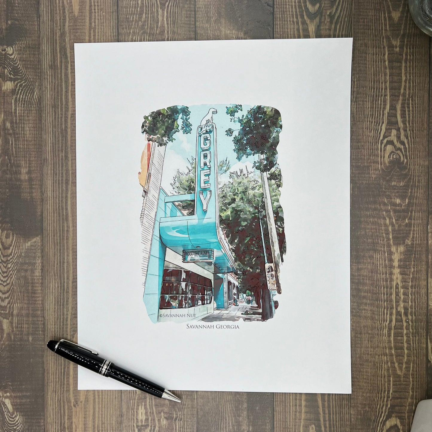 watercolor painting of The Grey Restaurant Savannah Georgia printed on a 20 inch by 20 inch throw pillow