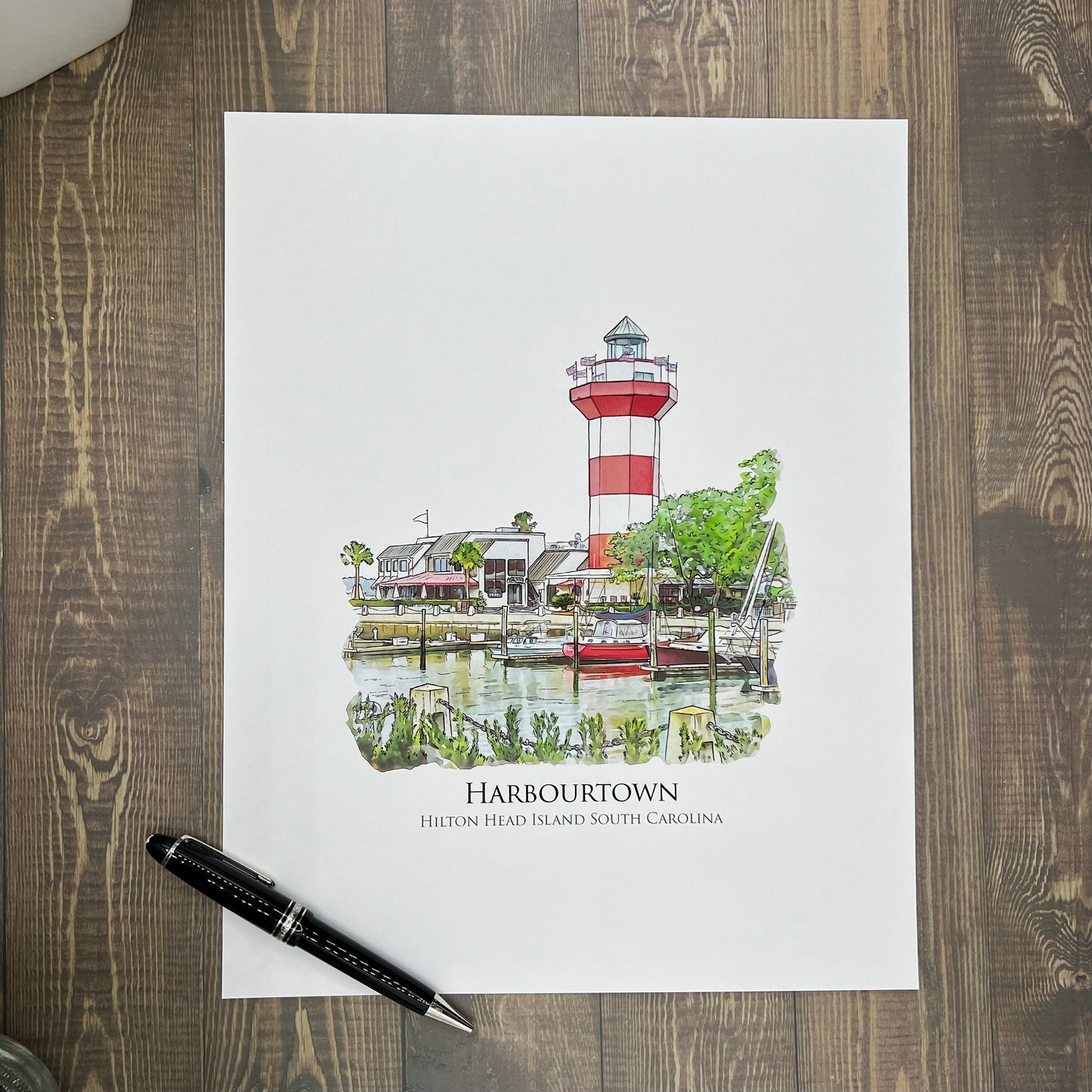 watercolor painting of Harbourtown Lighthouse Hilton Head Island South Carolina printed on a 20 inch by 20 inch throw pillow