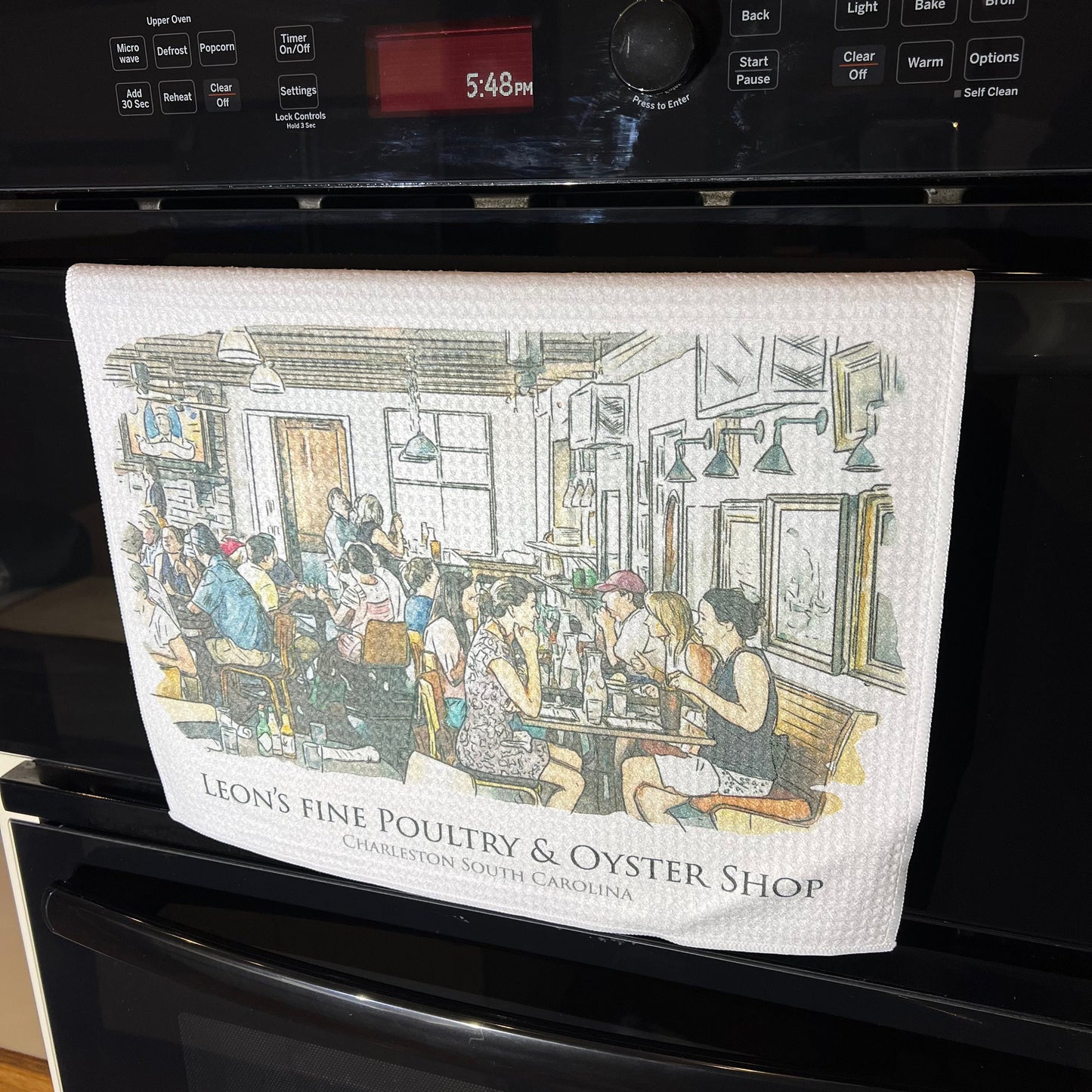 Leons Oyster Shop Charleston South Carolina (watercolor painting) printed on a microfiber kitchen towel 16" x 24"